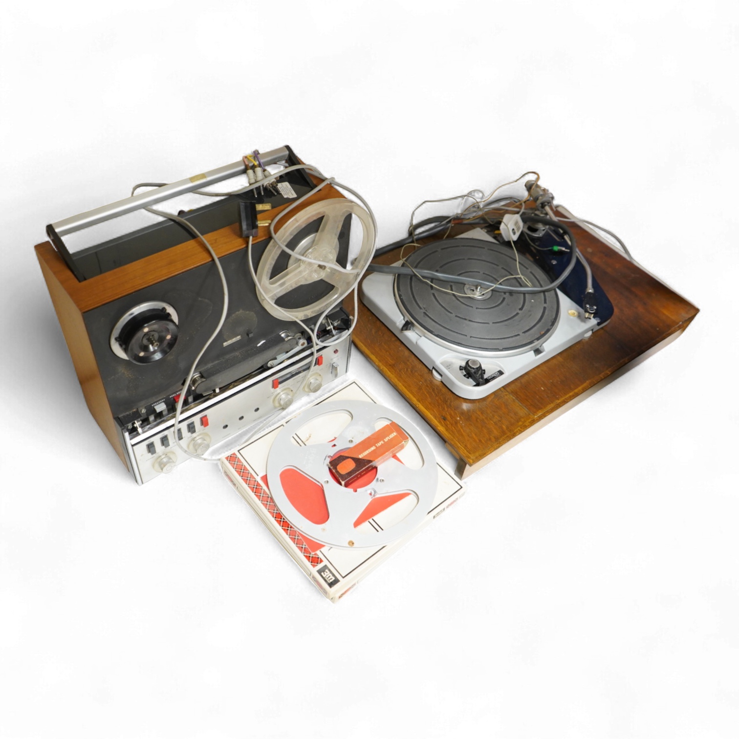 A Revox reel to reel Tape Recorder A77, with instruction booklet and tape, together with a Thorens TD 124/11 turntable record player, plus a pair of Lowther EX3 speakers contained within home-made cabinets